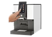 Der Kaffeevollautomat für Unternehmen WMF 1100S in der Seitenansicht.